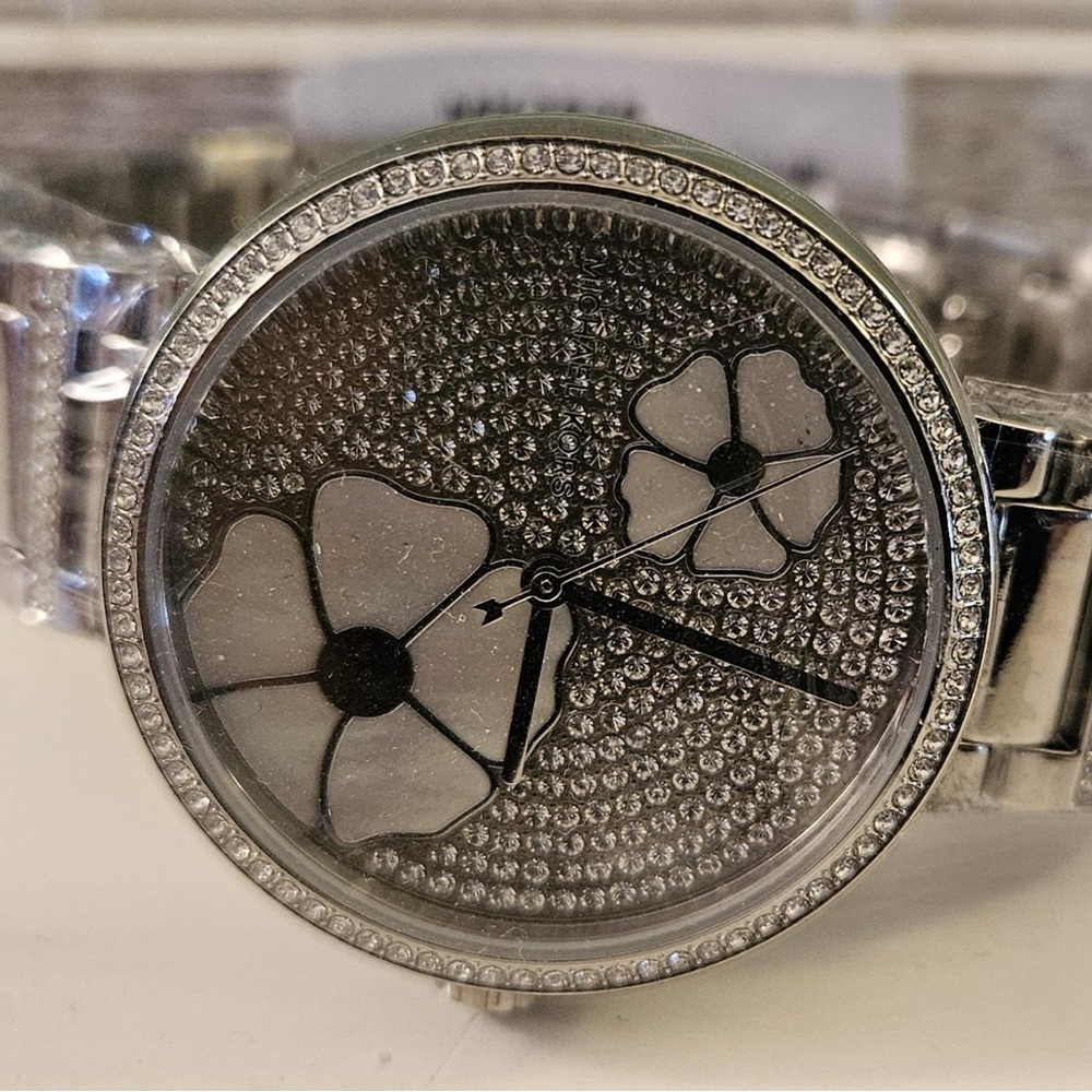Silver brand new Michael Kors watch